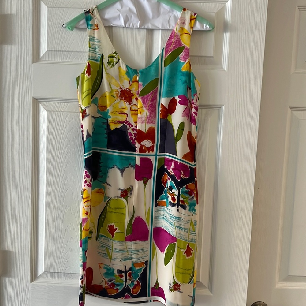 Knee length dress with pretty watercolor print. Lined.